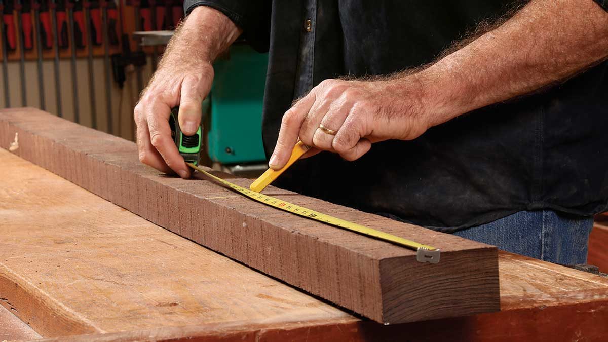 tape measurer measuring wood