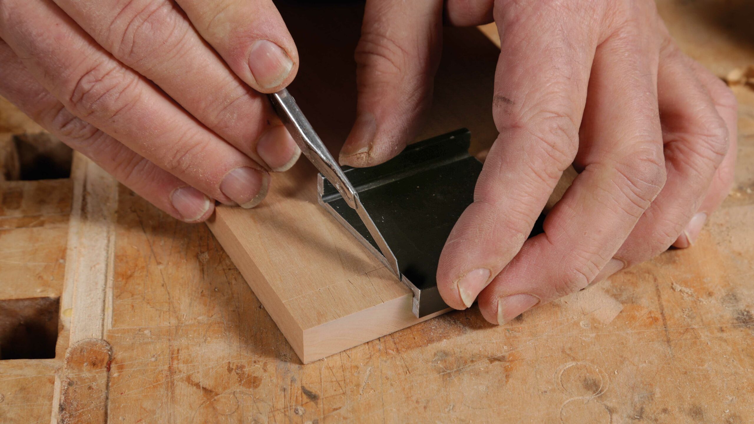 Mark tails on just one board. When cutting the tails, you will gang up all boards that have the same width and layout, so only the top board needs layout marks.